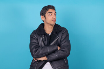 trendy young man isolated on hispanic latin american race color background