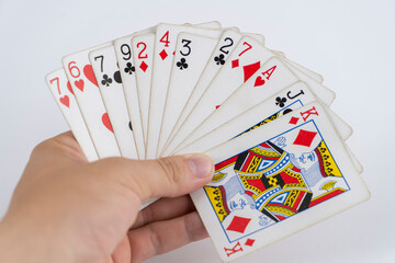 Playing cards for poker tricks on a macro background