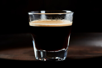  Cup of espresso on dark background. Close up.