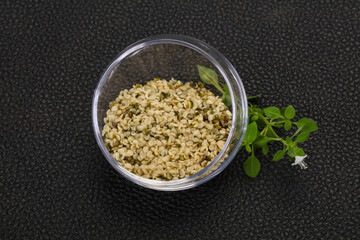 Peeled hemp seeds in the bowl