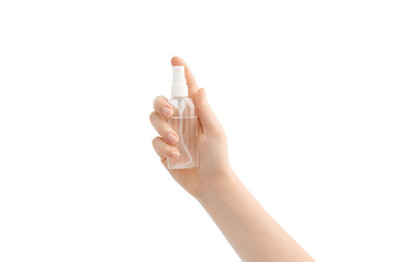 Woman holds alcohol-based hand-washing spray as a preventive hygiene measure against coronavirus....