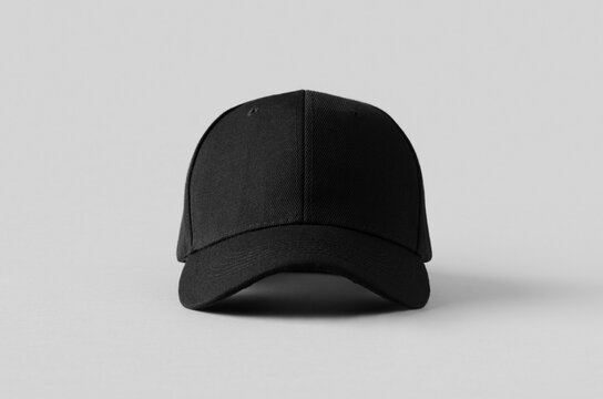 Black baseball cap mockup on a grey background, front view.