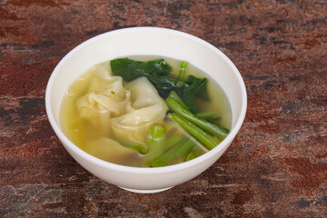Asian traditional Wonton soup with herbs
