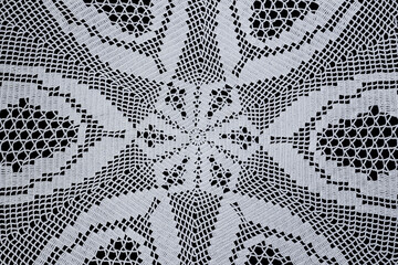 Middle of handmade round lace tablecloth, close up