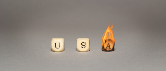 USA written with letter cubes, burning, crisis, racism, civil movement, , headline, riot, illustration