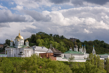 Fototapeta na wymiar Nizhny Novgorod. View of the Annunciation Monastery on a sunny day and cloudy sky