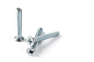 Screw nuts on a white background with copy space. Stainless screws, bolts for construction