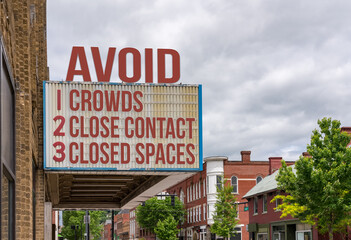 Mockup of movie cinema billboard with three C rules to avoid the coronavirus or Covid-19 of avoid crowds, close contact and closed spaces