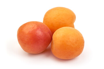 Sweet juicy apricots, ripe nectarines, isolated on white background