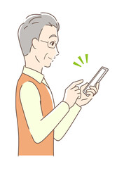 スマホを操作して笑顔な男性の横顔