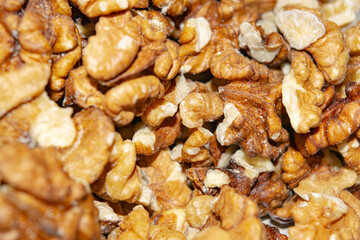 Peeled walnuts close-up. Surface texture. Healthy diet.