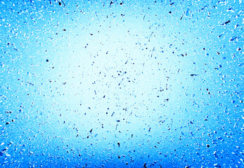 Blue paint splashes on wall texture background
