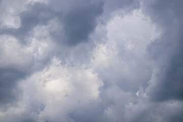 Blurred dramatic dark clouds before storm and rainy.