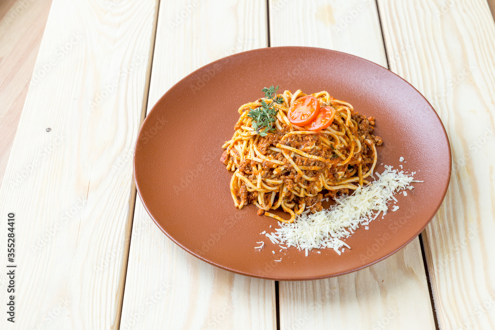 Wall mural Homemade Pasta with Cheese on the Wooden Background, Healthy Food, Free Space for Text