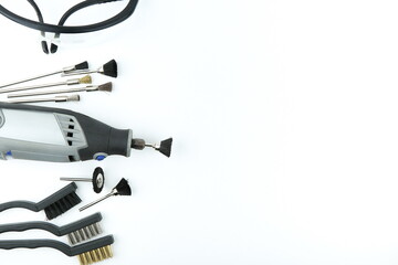 electric rotary tools on white background with copy space