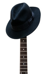 Vintage hat resting on a guitar fretboard isolated background