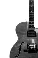Hollow body electric guitar isolated on white background in black and white