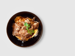 Stir fried pork teriyaki with garlic and sauce on rice