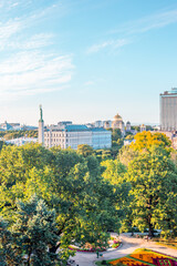 RIGA - 4 JULY, 2018: Amazing Aerial View of the Statue of Liberty Milda in Riga, Park and City of Riga, Latvia - Image