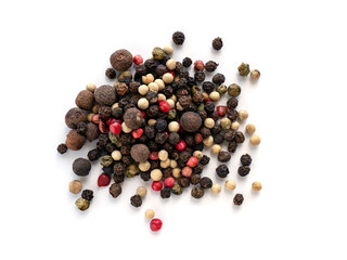 A mixture of peppers. Black, white, red polka dots. Isolated on a white background. Selected sharpness