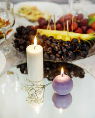 Two candles on the glass