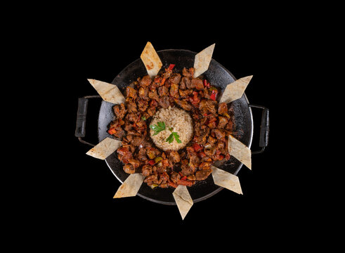 Meat saute in traditional pan - Sac kavurma, Turkish Food. steak food isolated. middle east cuisine. sac tava