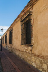 Narrow pedestrian zones and facades in the colonial zone of Santo Domingo, Dominican Republic. 