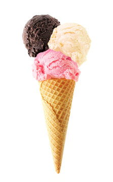 Triple scoop ice cream cone isolated on a white background. Chocolate, vanilla and strawberry flavors in a waffle cone.