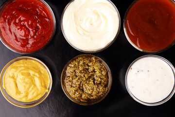 Sauces Assortment. Set of various sauces in bowls with ketchup, mayonnaise and mustard