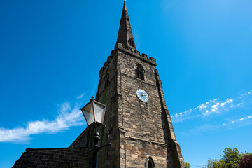 Tall stone church clock tower image