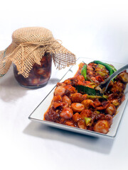 Homemade Hot and spicy Chutney in plate and Jar.  Sri Lankan cuisine. Favorite Briyani dish.  