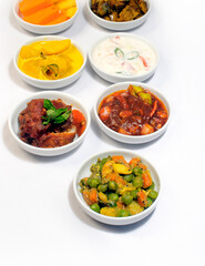 Set menu dishes for  Sri Lankan style Chicken Briyani on white background. 