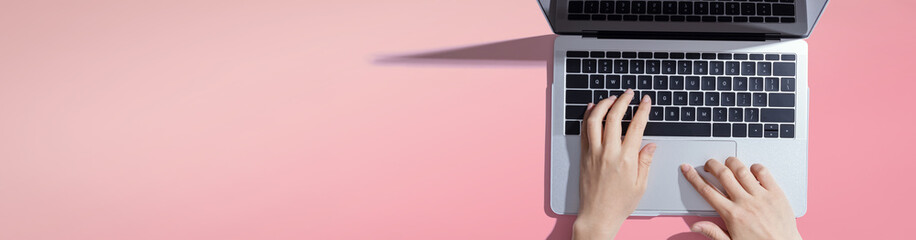 Person using a laptop computer from above