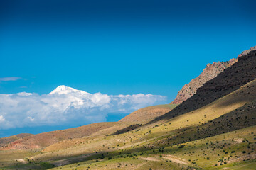 Fototapeta premium Mountain landscape, view of Mount Ararat, a landmark of Armenia