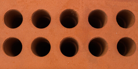 Red brick block close-up. Texture