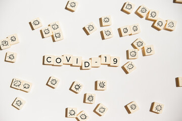 Letters with the word Covid-19 on white background