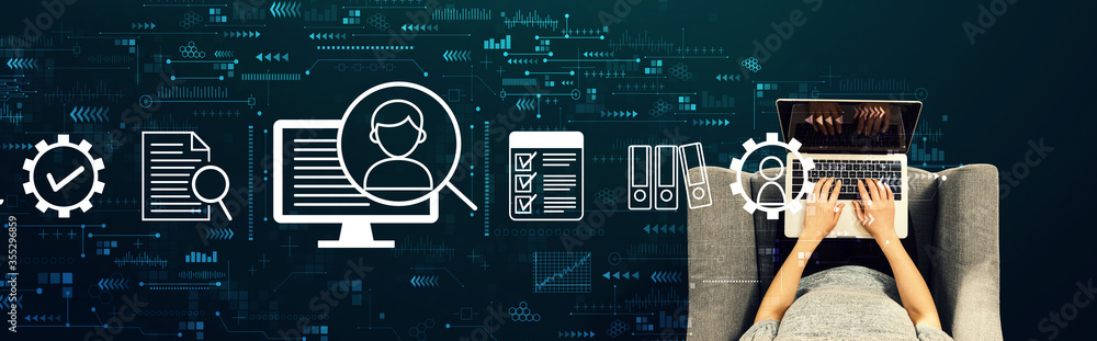 Poster document management system concept with person using a laptop in a chair