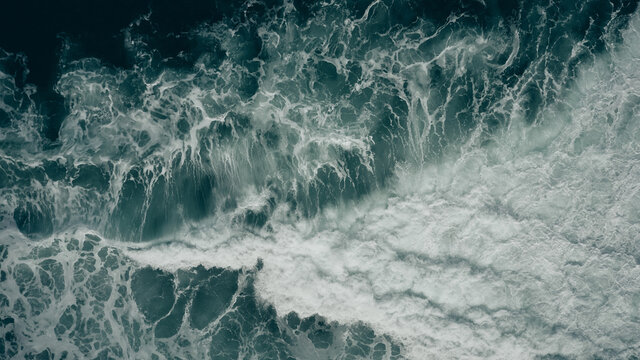 wave breaking over reef from above