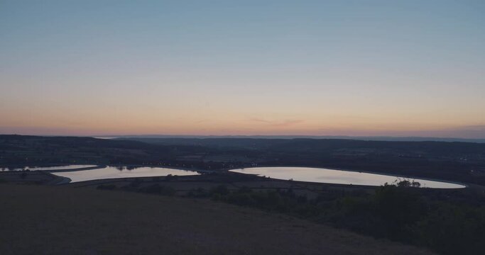 Reservoirs in countryside at dusk