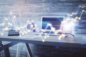 Double exposure of financial graph drawing and office interior background. Concept of stock market.