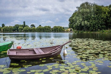 Obraz premium Wooden boats on a River Netta in Augustow town, Podlasie region of Poland