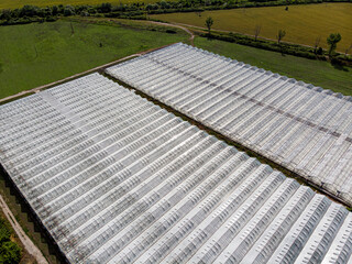 Greenhouse for early fruits and vegetables. Aerial photo.
