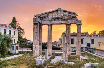 The Gate of Athena Archegetis at sunset at Roman Agora, Athens, Greece.