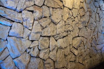 Interior wall stone facade rustic structure. natural looking background.