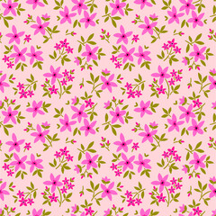 Vintage floral background. Seamless vector pattern for design and fashion prints. Flowers pattern with small pink flowers on a pale pink background. Ditsy style. 
