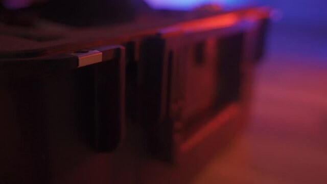 Protective case for delicate equipment is set then hands open and close latches