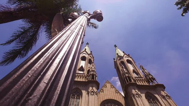 Sao Paulo Cathedral, Brazil. Low Angle View Behind Street Light Pole. Catholic Landmark Under Beautiful Sky