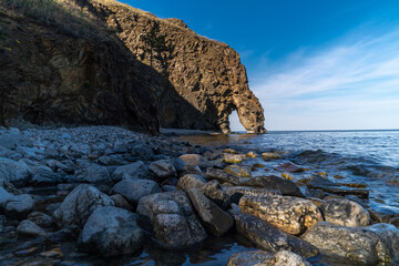 Stone arch on the shore of Lake Baikal