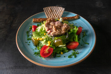 Tuna Fish Salad with Lettuce, Cherry Tomatoes, Cucumber and Corn.