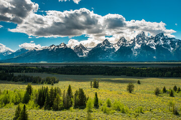 Landscape with mountains and clouds, Snowcapped Teton range, Grand Teton National Park, Wyoming